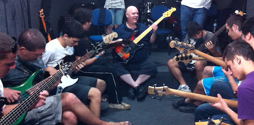 A large group of bassists playing together in Brazil