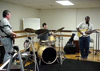 Richard, Tommy and Everett performing