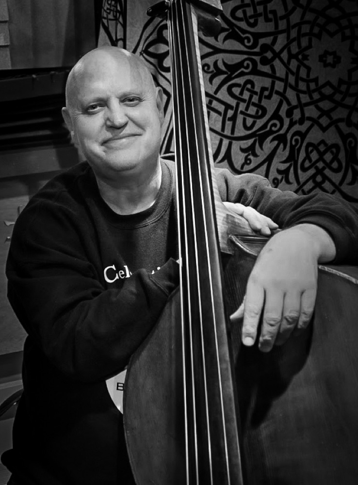 Black and white portrait of Jim Stinnett with his double bass